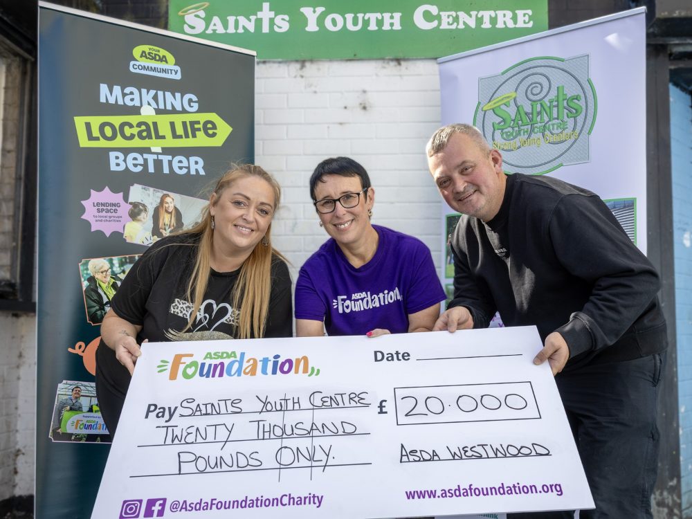 Representatives from Saints Youth Centre and Asda Belfast Westwood’s Community and Customer Champion with a £20,000 grant cheque.