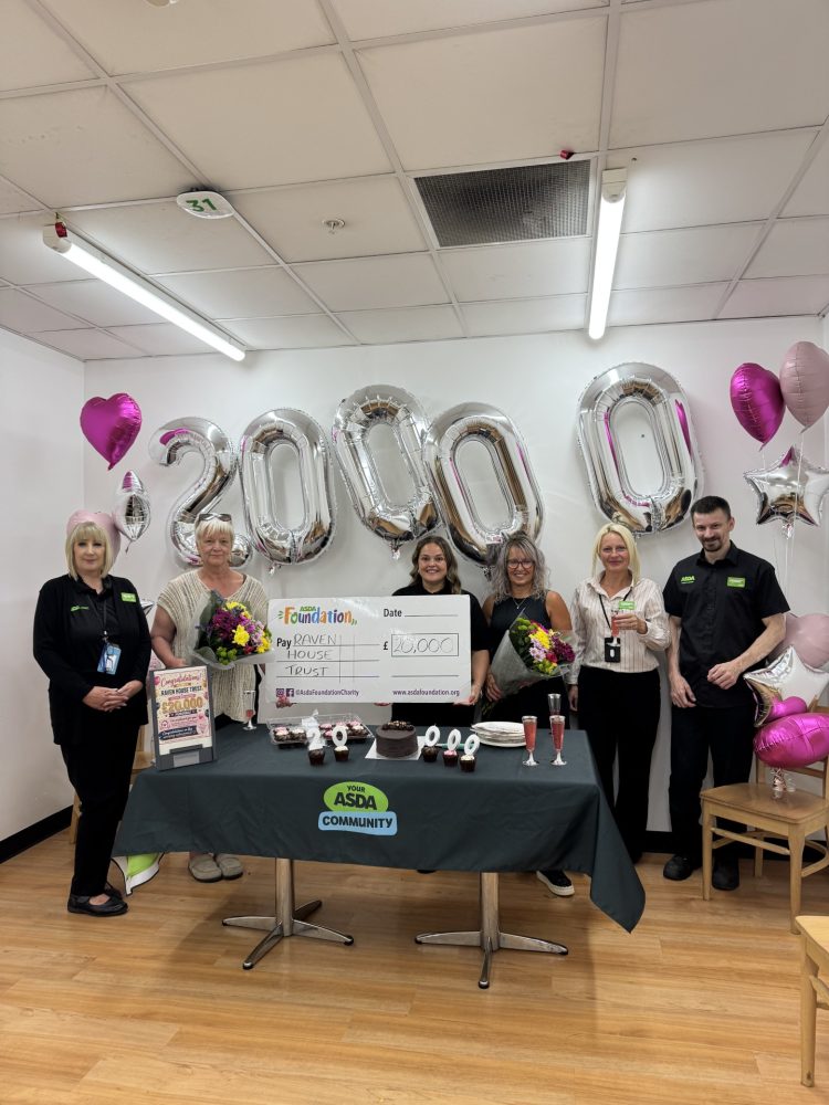Raven House Trust representatives and Asda colleagues mark a £20,000 funding award.